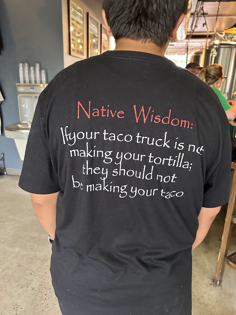 Native Grill t-shirt reading Native Wisdom: if your taco truck is not making your tortilla, they should not be making your taco