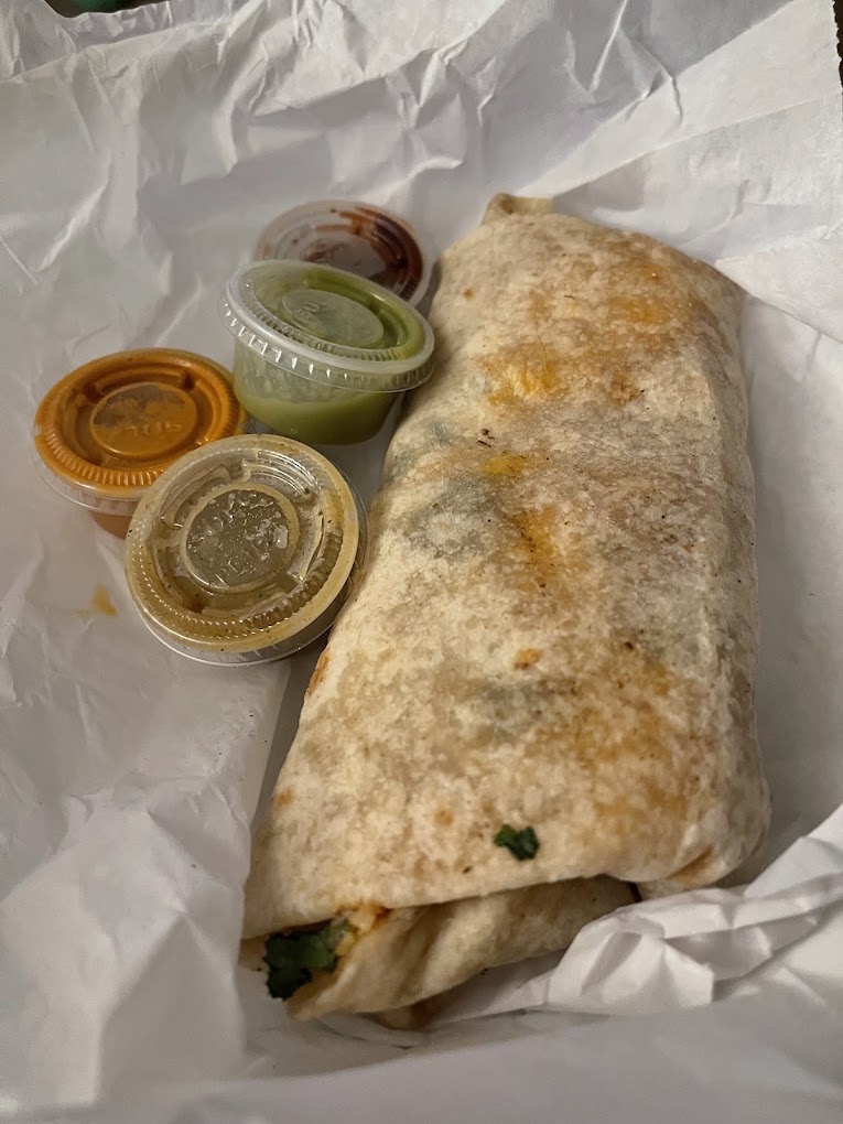 Grilled burrito served with four house salsas